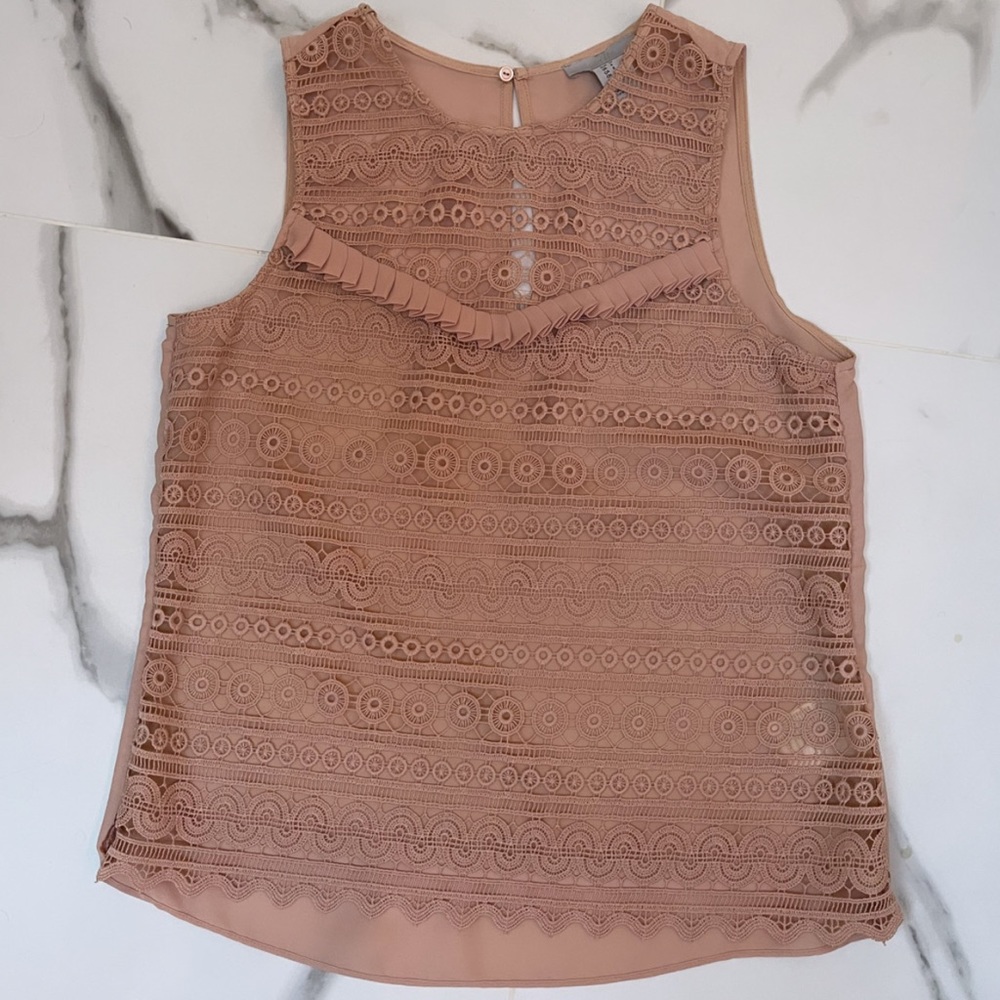 Pink sleeveless blouse